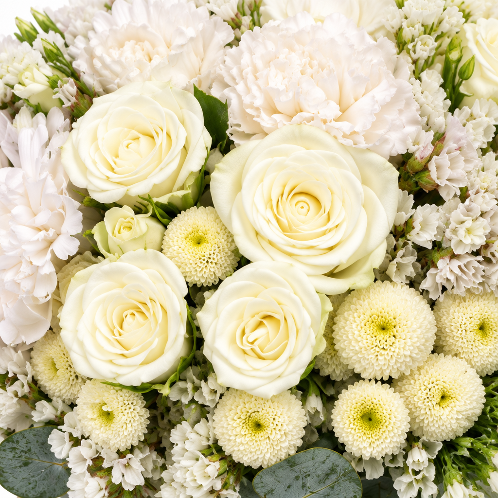 Close detail of the mixed white bouquet flowers