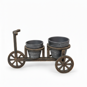 Rustic bicycle double planter shown with both pots empty