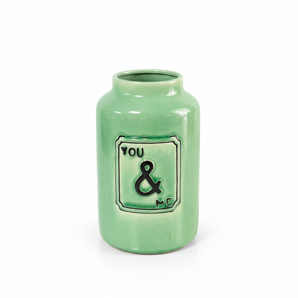Close-up of mint green You and Me ceramic vase without flowers