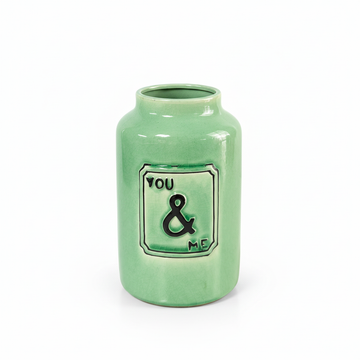 Close-up of mint green You and Me ceramic vase without flowers