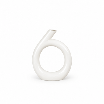 White circular sculptural ceramic vase shown smaller without flowers or stems