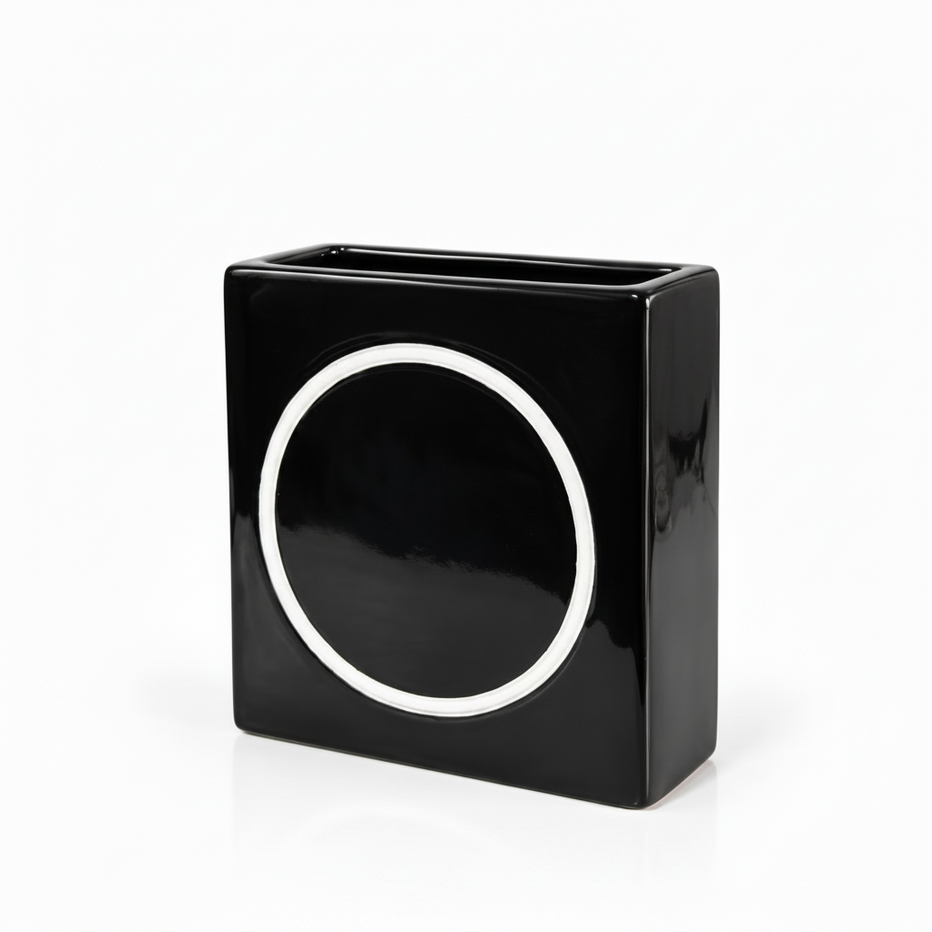 Modern black square ceramic vase with white circle accent shown without flowers