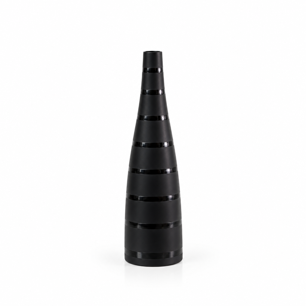Tall black tapered striped ceramic vase shown empty with generous white space