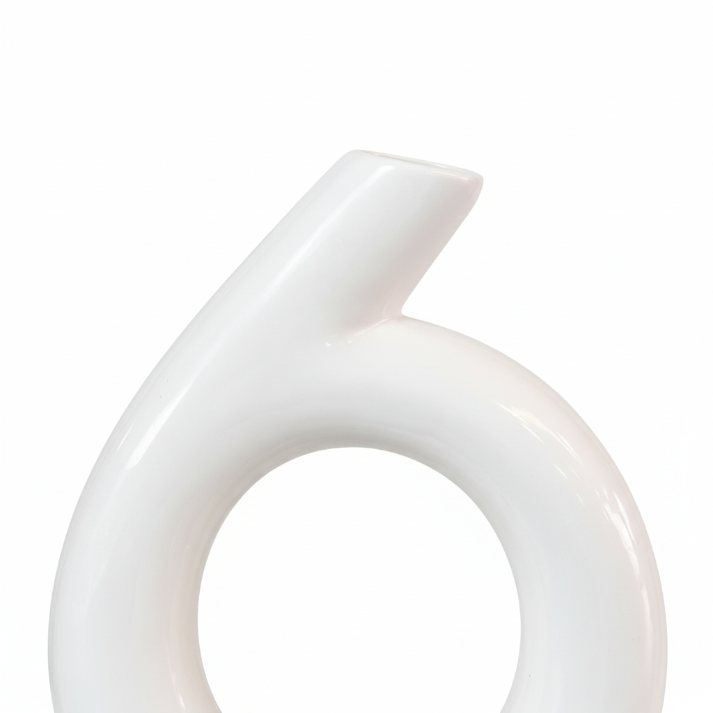 Close-up detail of glossy white ceramic ring vase and angled neck