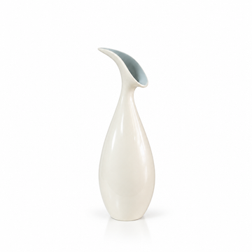 Ivory curved sculptural ceramic vase shown empty with generous white space