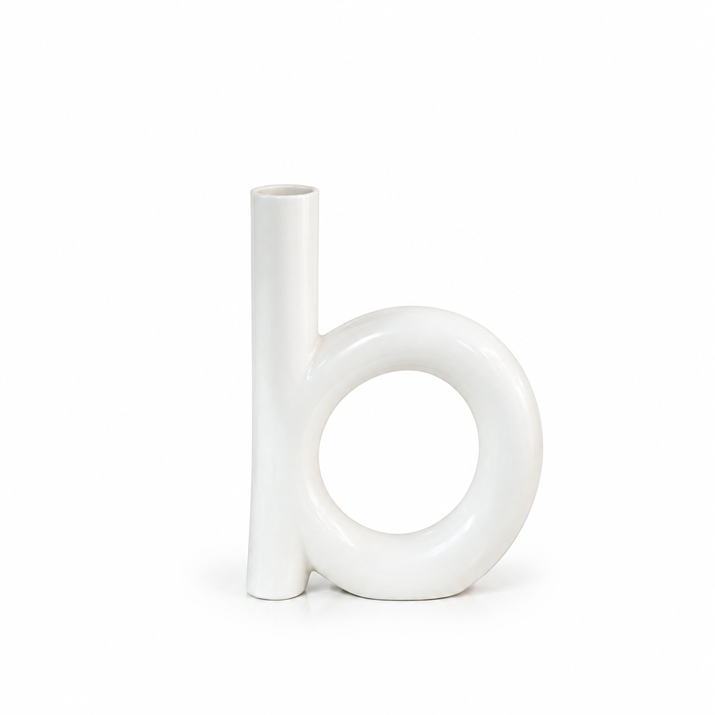 Modern white loop ceramic vase shown without flowers on a white background