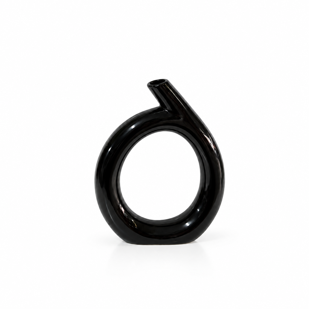 Modern black angled-neck ring ceramic vase shown empty with generous white space