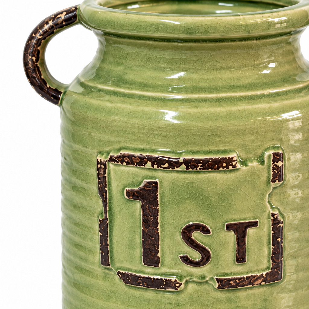 Close-up of embossed 1st panel, green glaze, distressed accents, and side handle