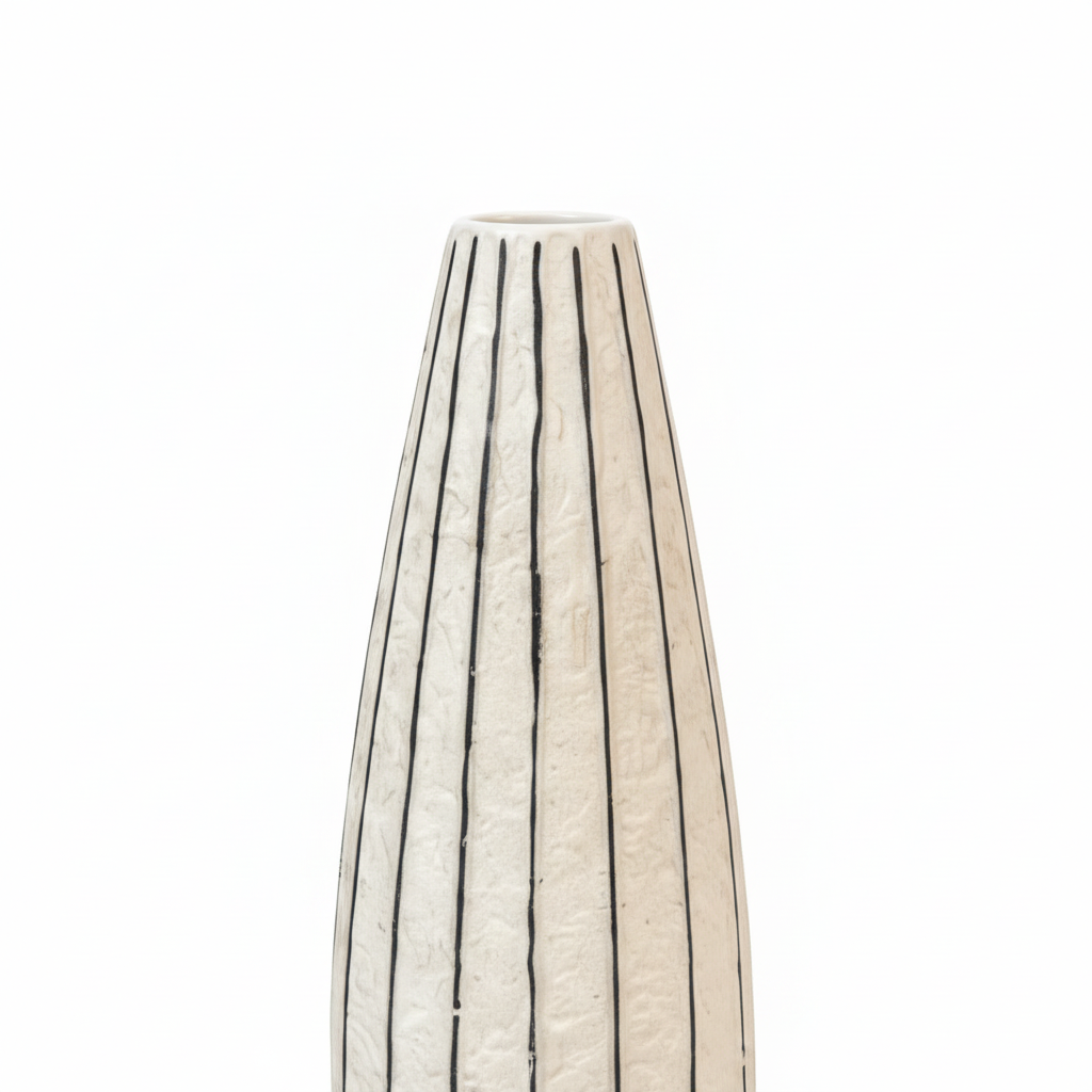 Close-up detail of ivory vase finish and thin vertical black linework