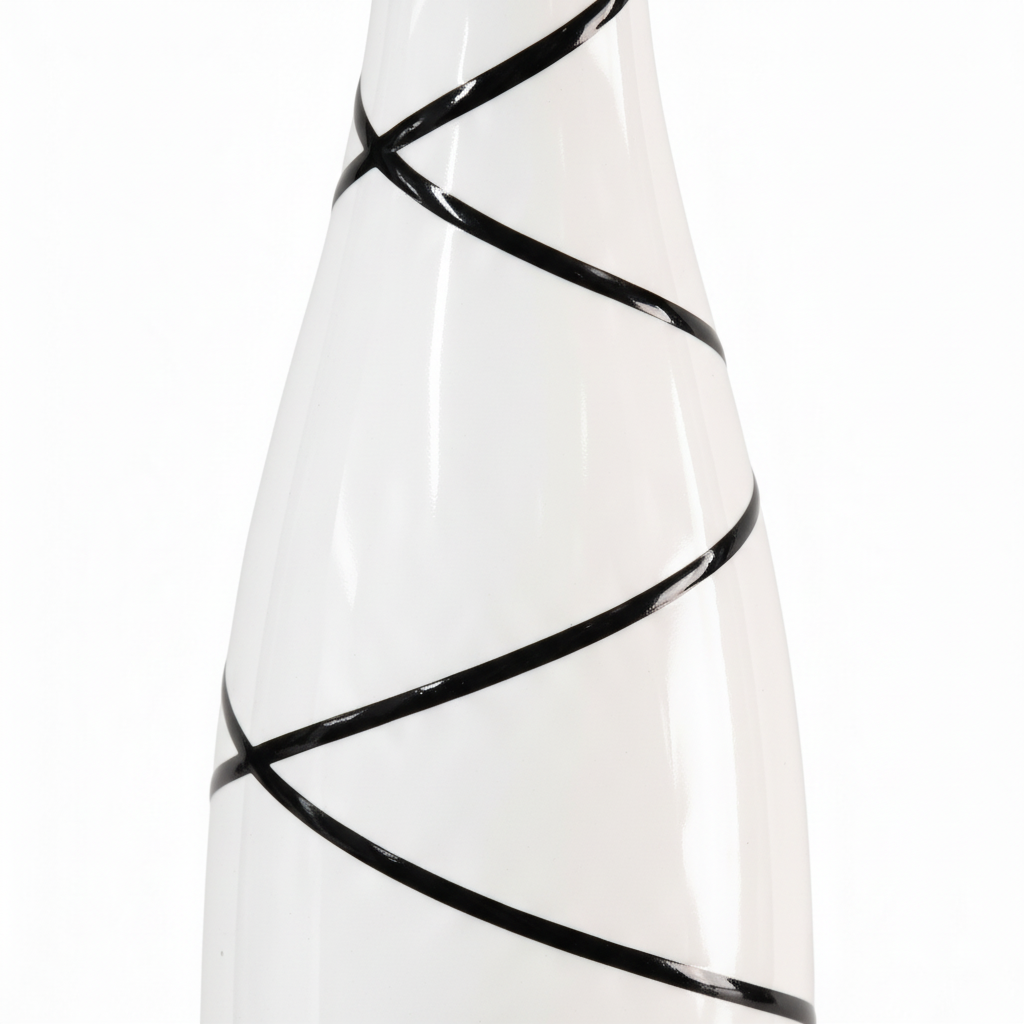 Macro detail of the white ceramic vase and black spiral lines