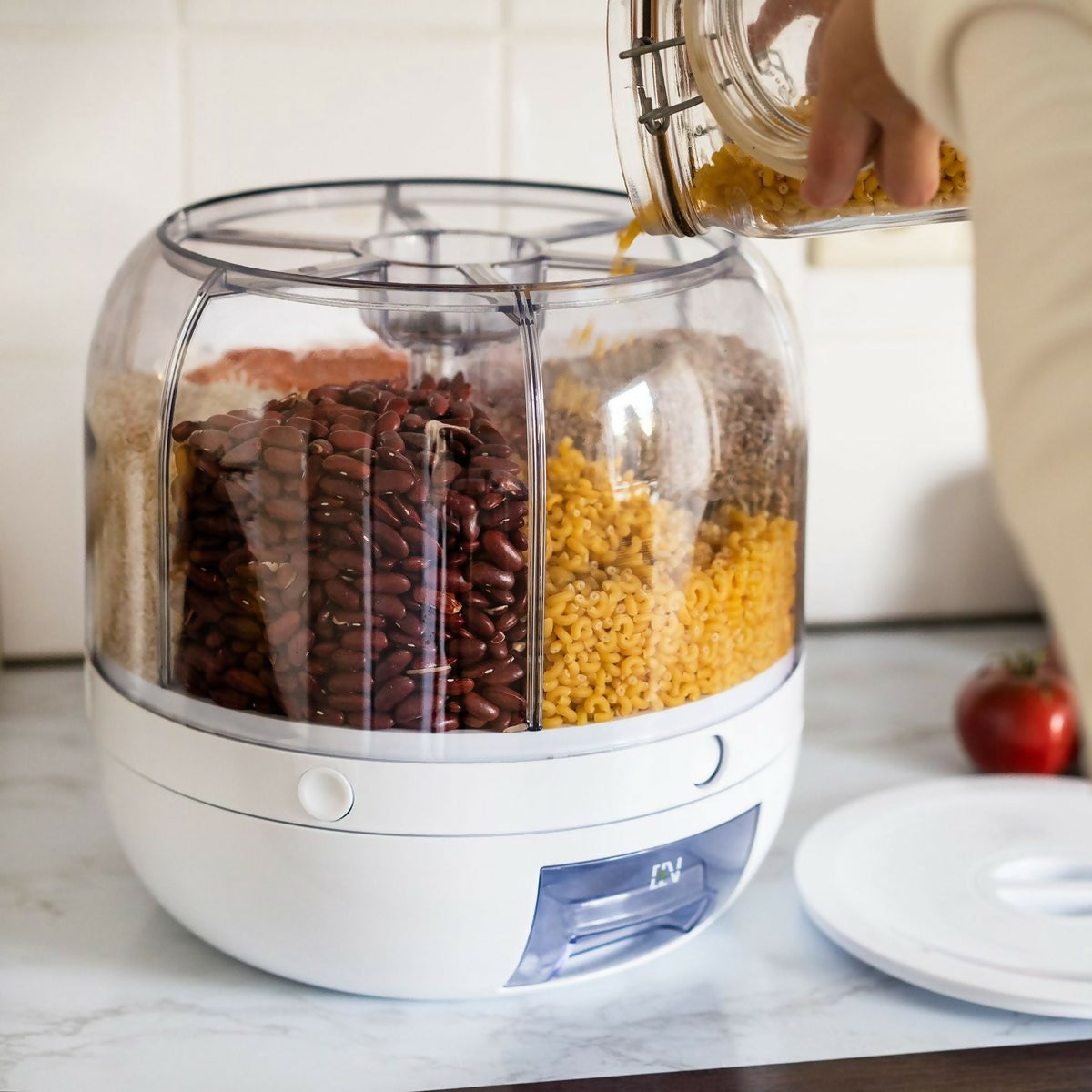 Rotating Grain Dispenser with Separate Storage Sections